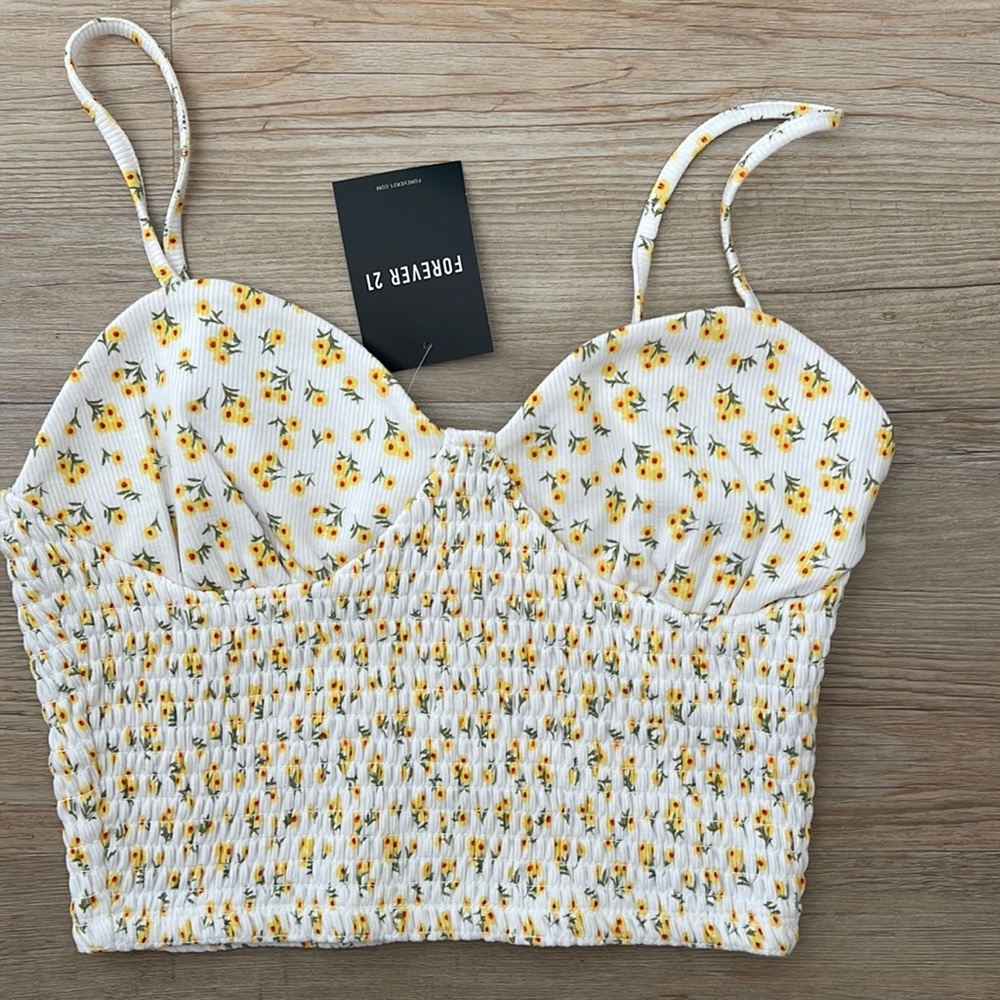 White with yellow daisies halter top. Brand new with tags.